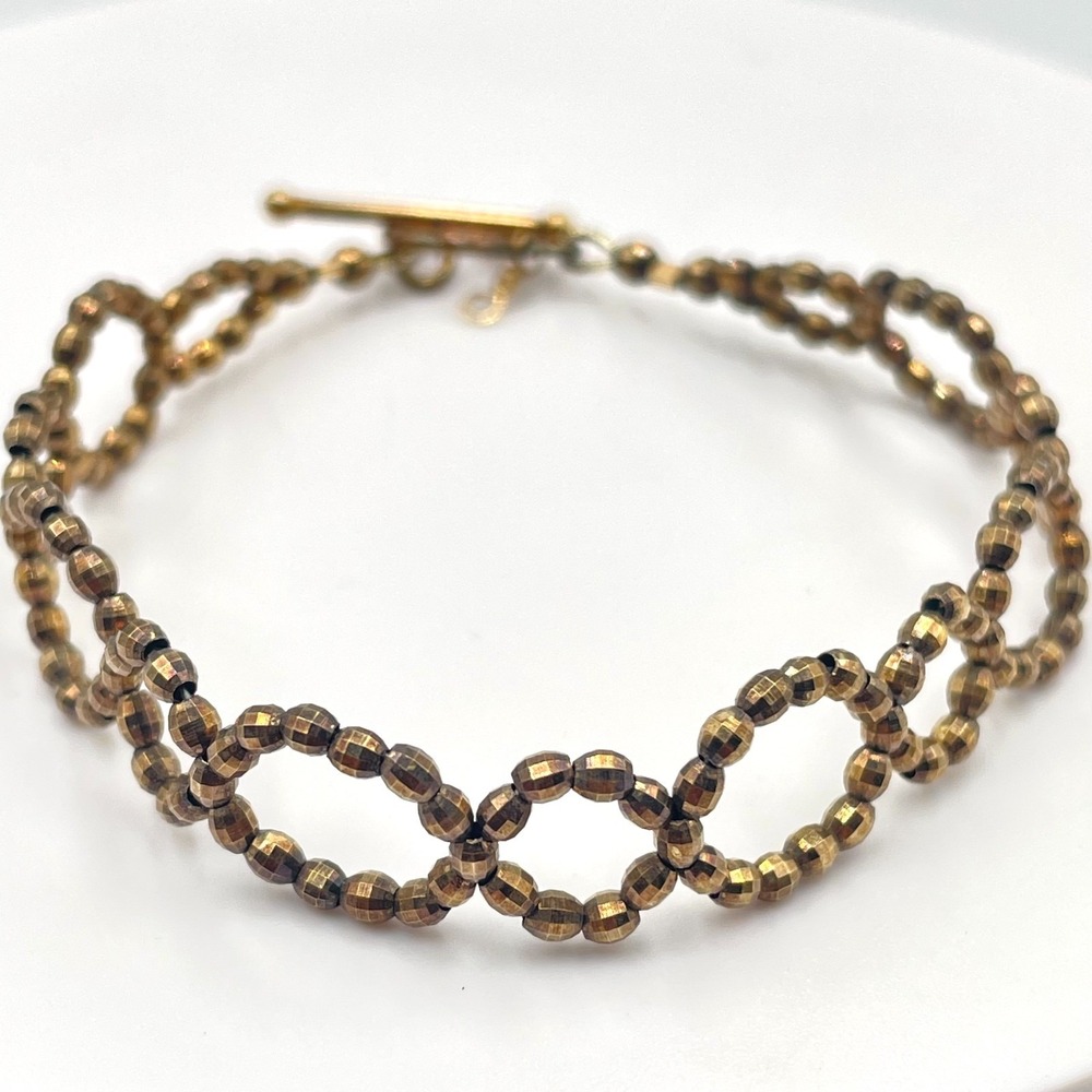Vintage Bronze Tone Faceted Metallic Bead Linked Infinity Loop Toggle Bracelet